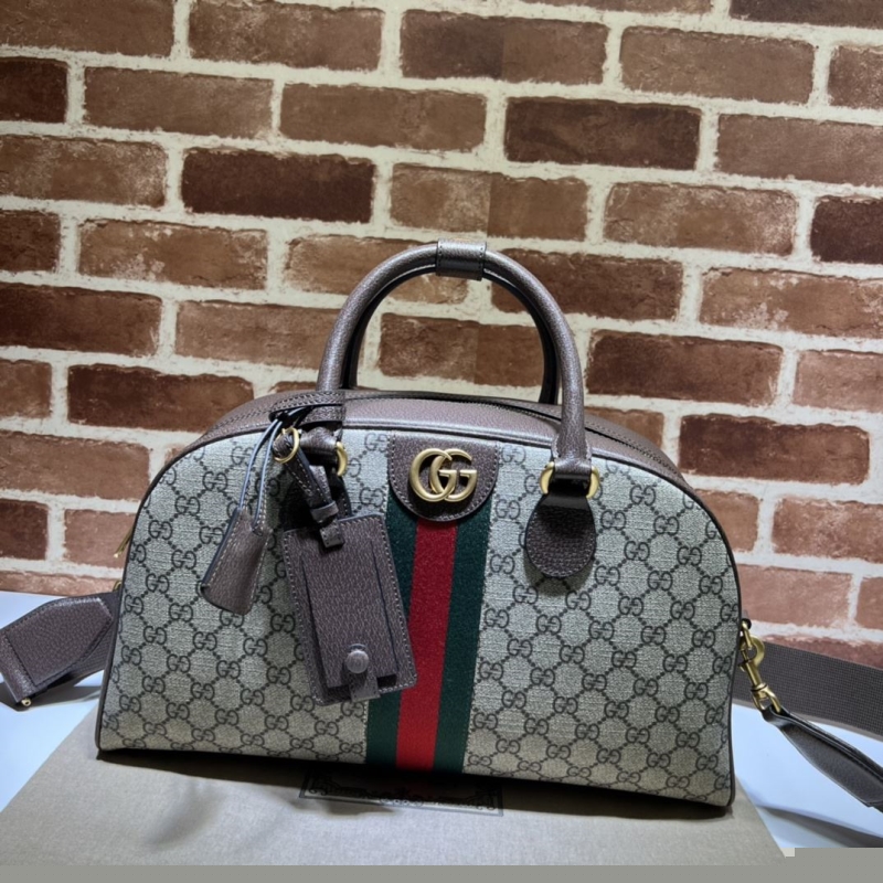 G*u*i top handle bags